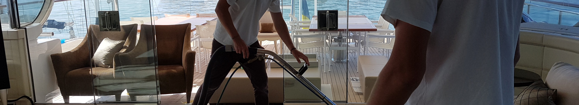 The team at work cleaning a yacht | Indi-Clean